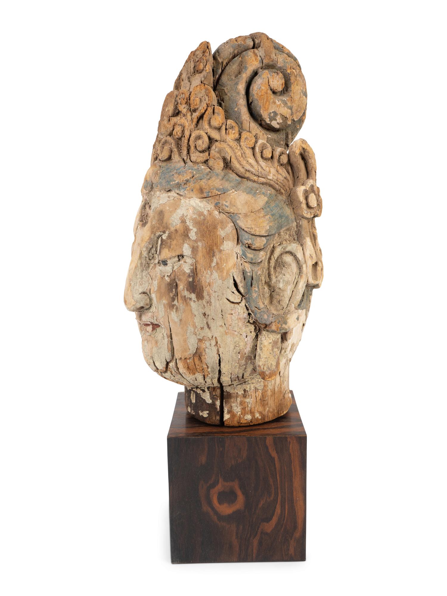 A Chinese Weathered Wood Head of Guanyin — 18TH CENTURY