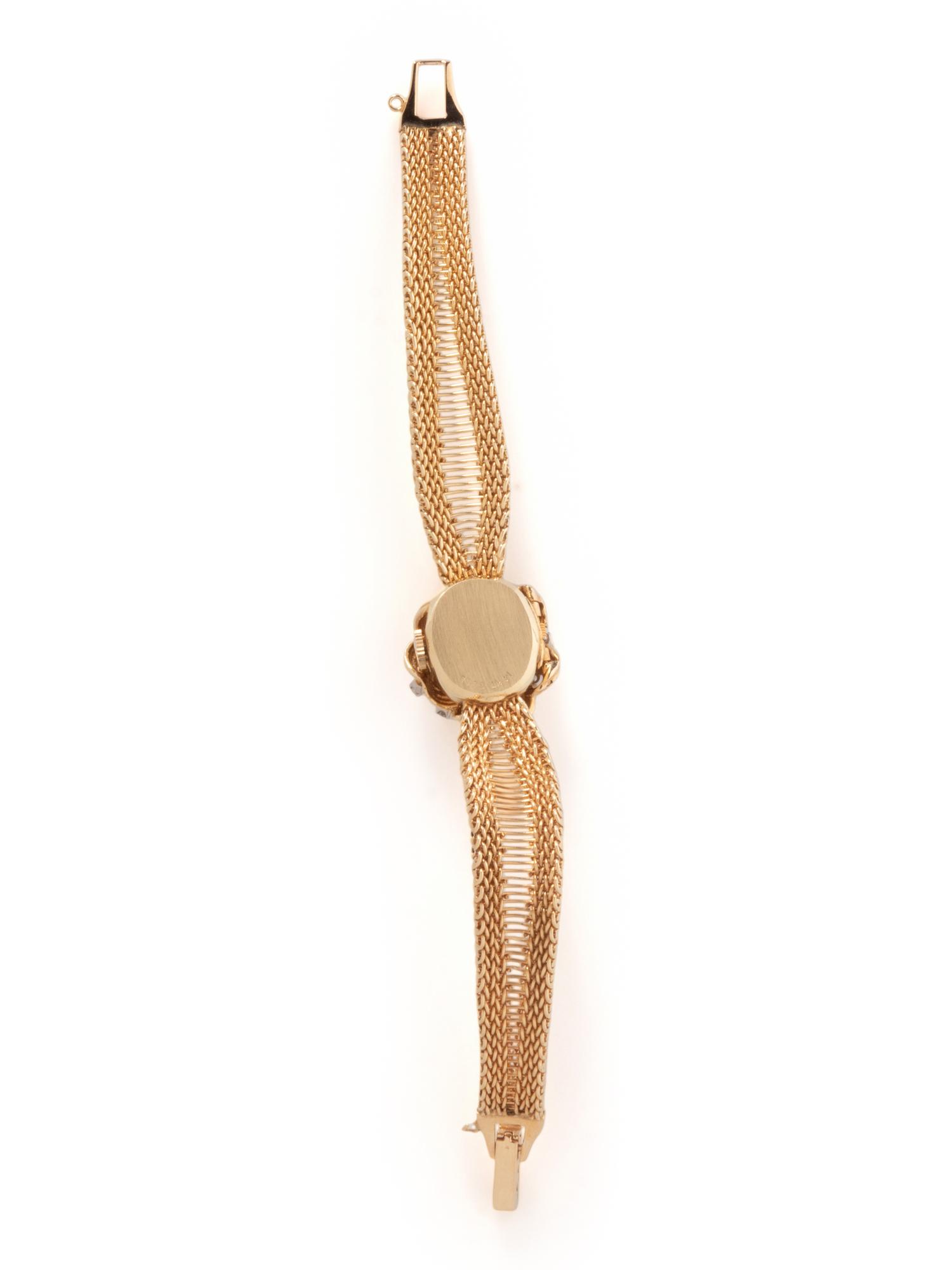 ELGIN, YELLOW GOLD AND DIAMOND SURPRISE WATCH