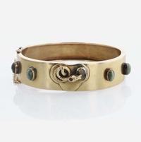A Cat's Eye Quartz, Ruby, and 14K Yellow Gold Bangle