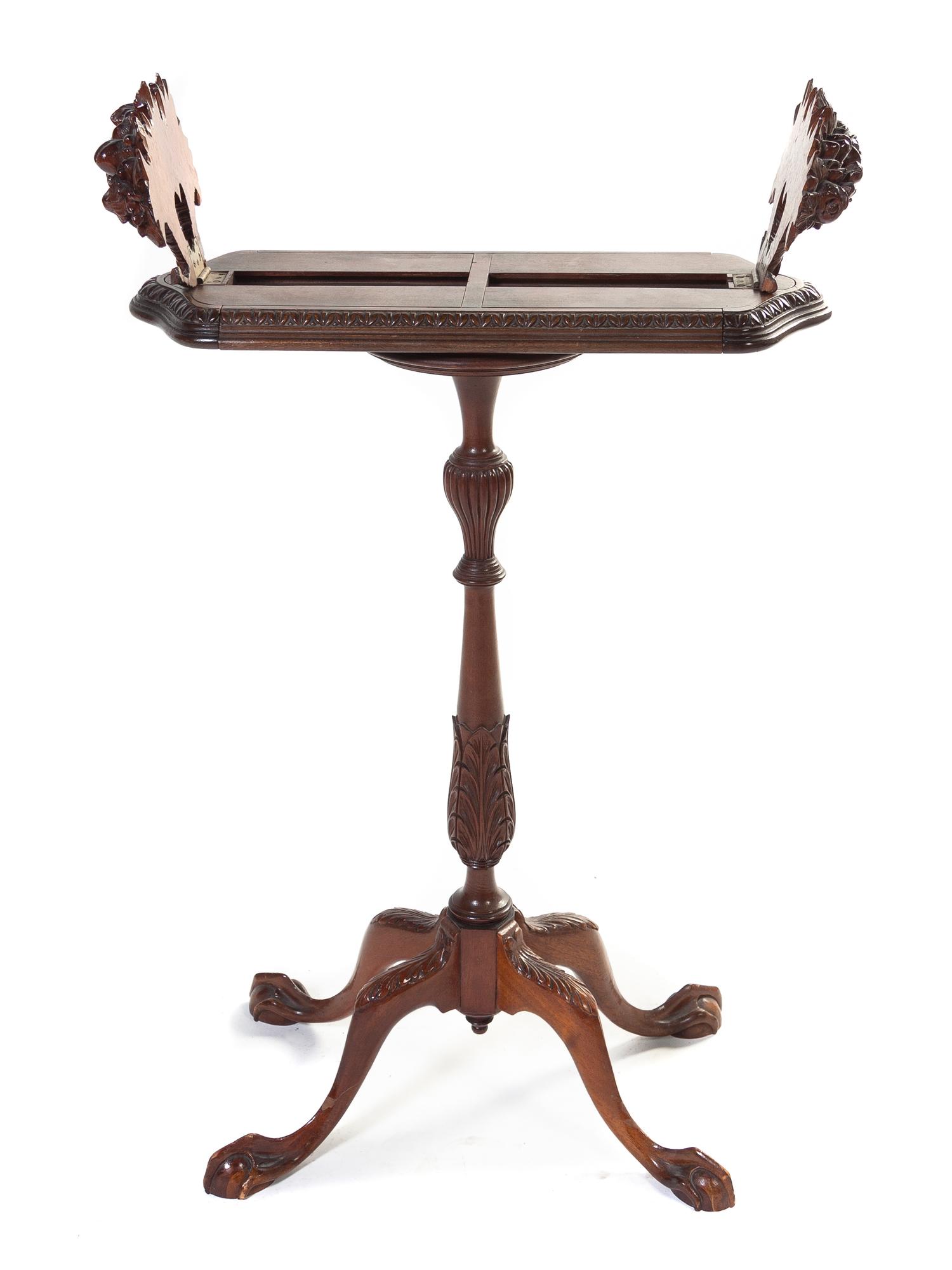 An English Mahogany Book Stand, Height 32 1/2 x width 22 x depth 8 1/2 inches.
