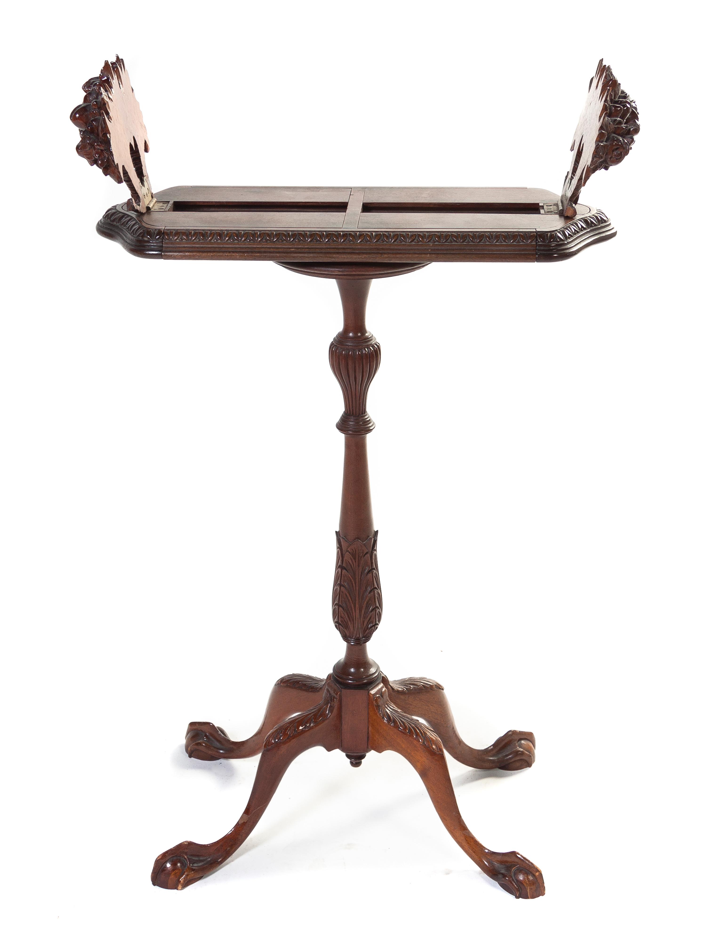An English Mahogany Book Stand, Height 32 1/2 x width 22 x depth 8 1/2 inches.