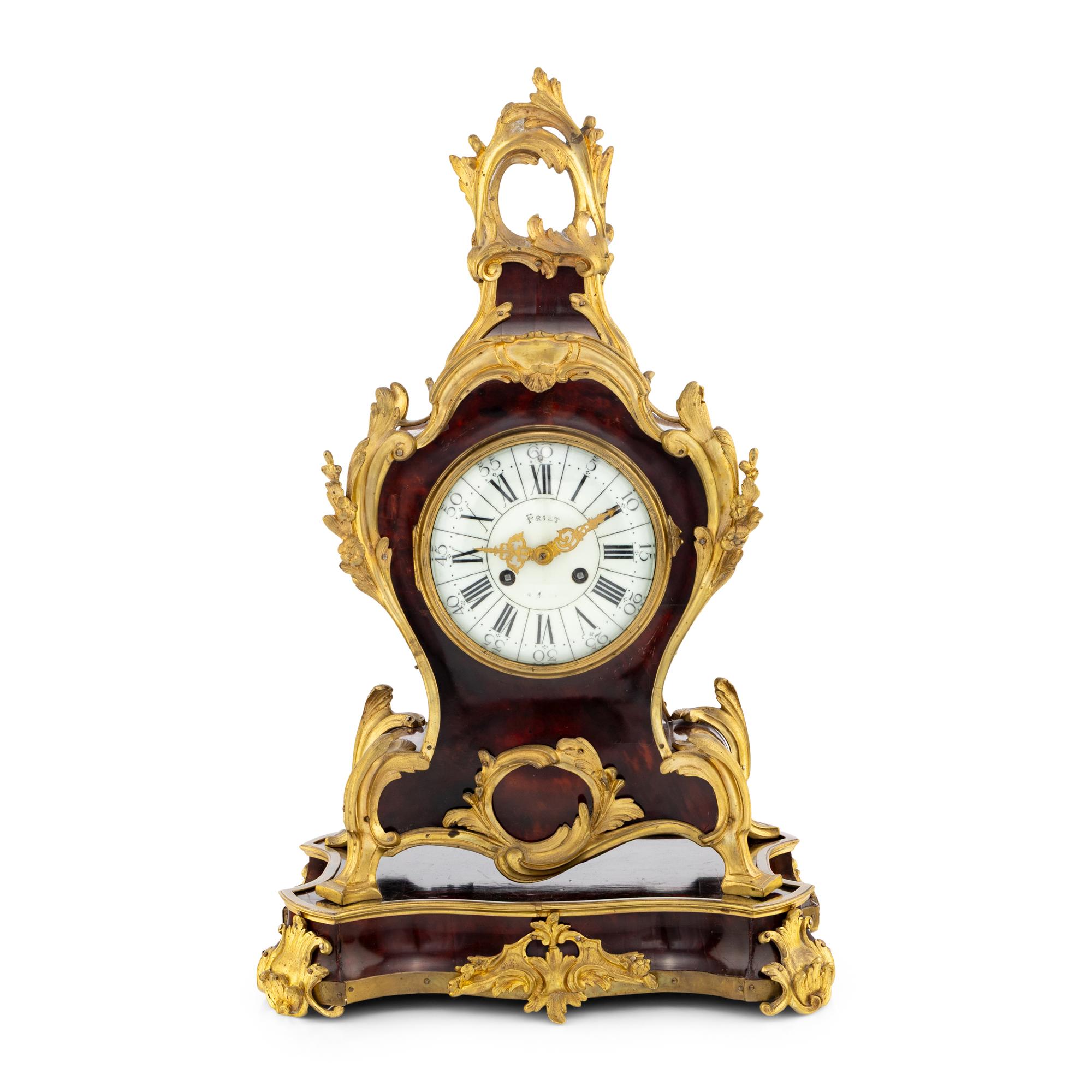 A French Gilt Bronze Mounted Faux Tortoise Shell Mantel Clock
