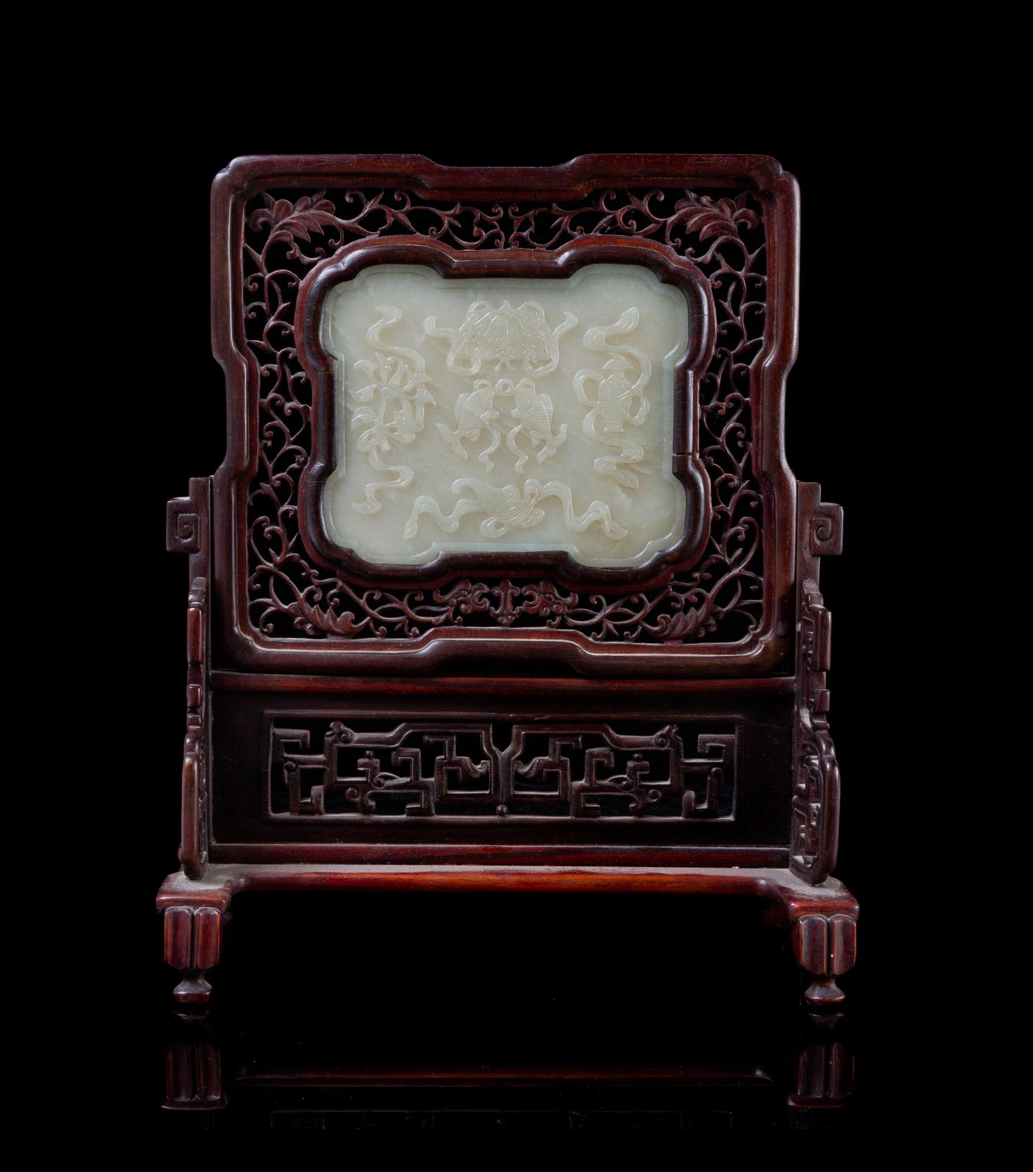 A Carved Celadon Jade Plaque Height of stone 4 1/4 x width 5 3/8 inches.
