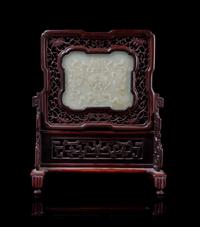 A Carved Celadon Jade Plaque Height of stone 4 1/4 x width 5 3/8 inches.