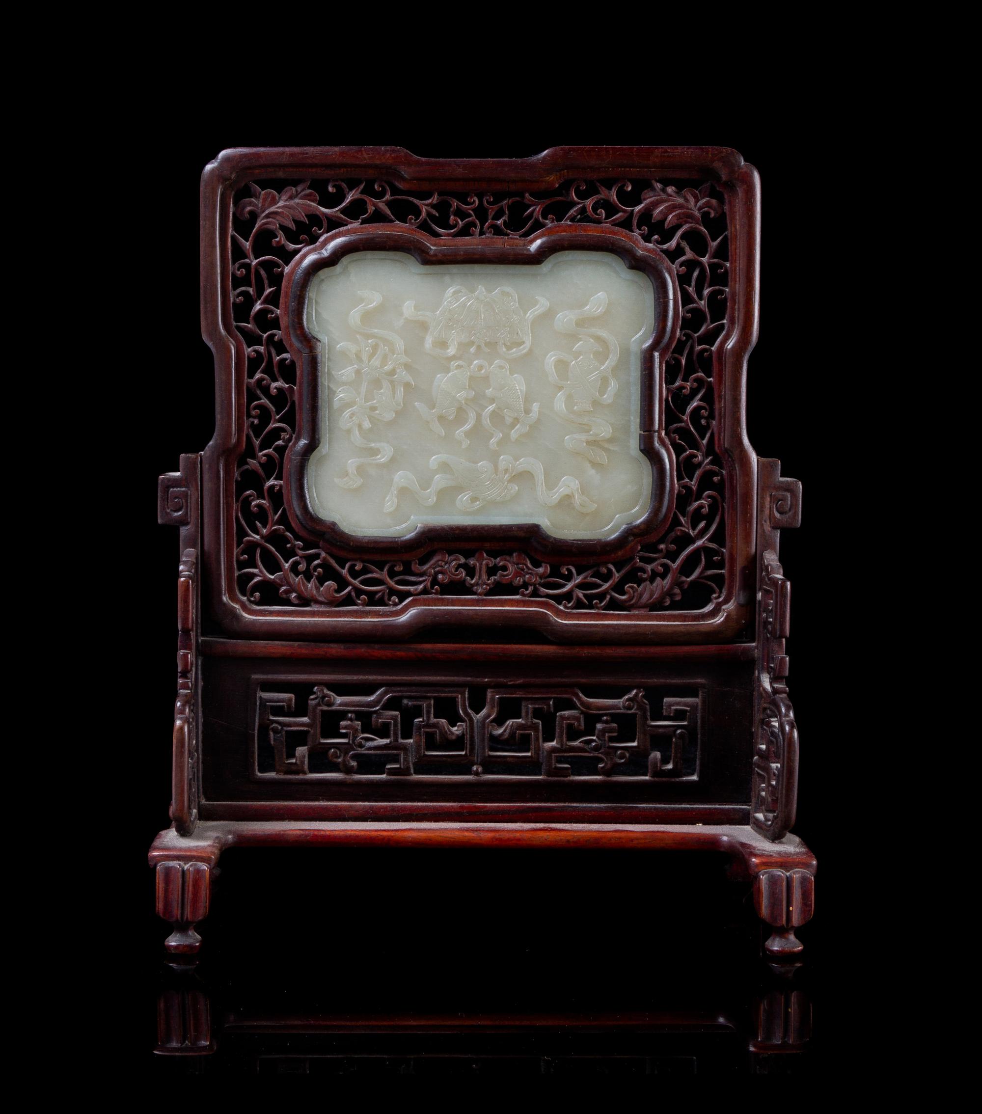A Carved Celadon Jade Plaque Height of stone 4 1/4 x width 5 3/8 inches.