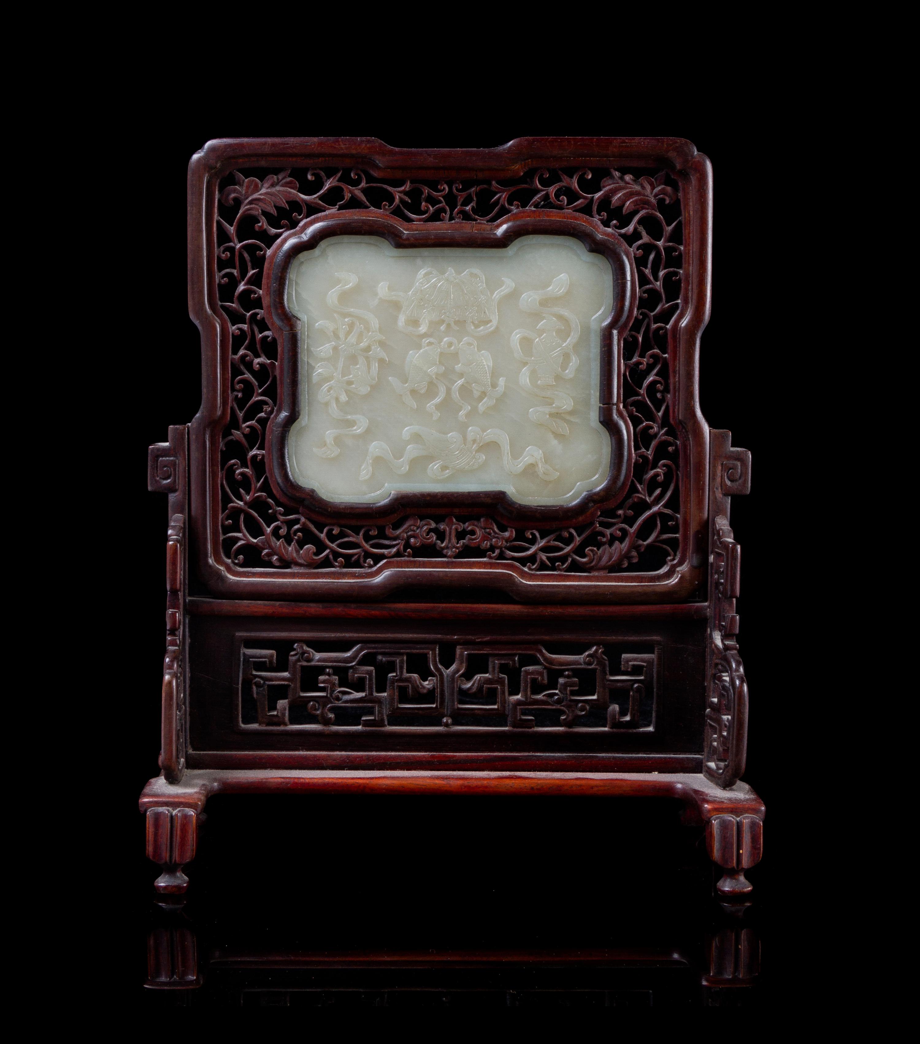A Carved Celadon Jade Plaque Height of stone 4 1/4 x width 5 3/8 inches.