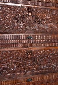 A Carved Huanghuali 'Dragon' Cabinet
