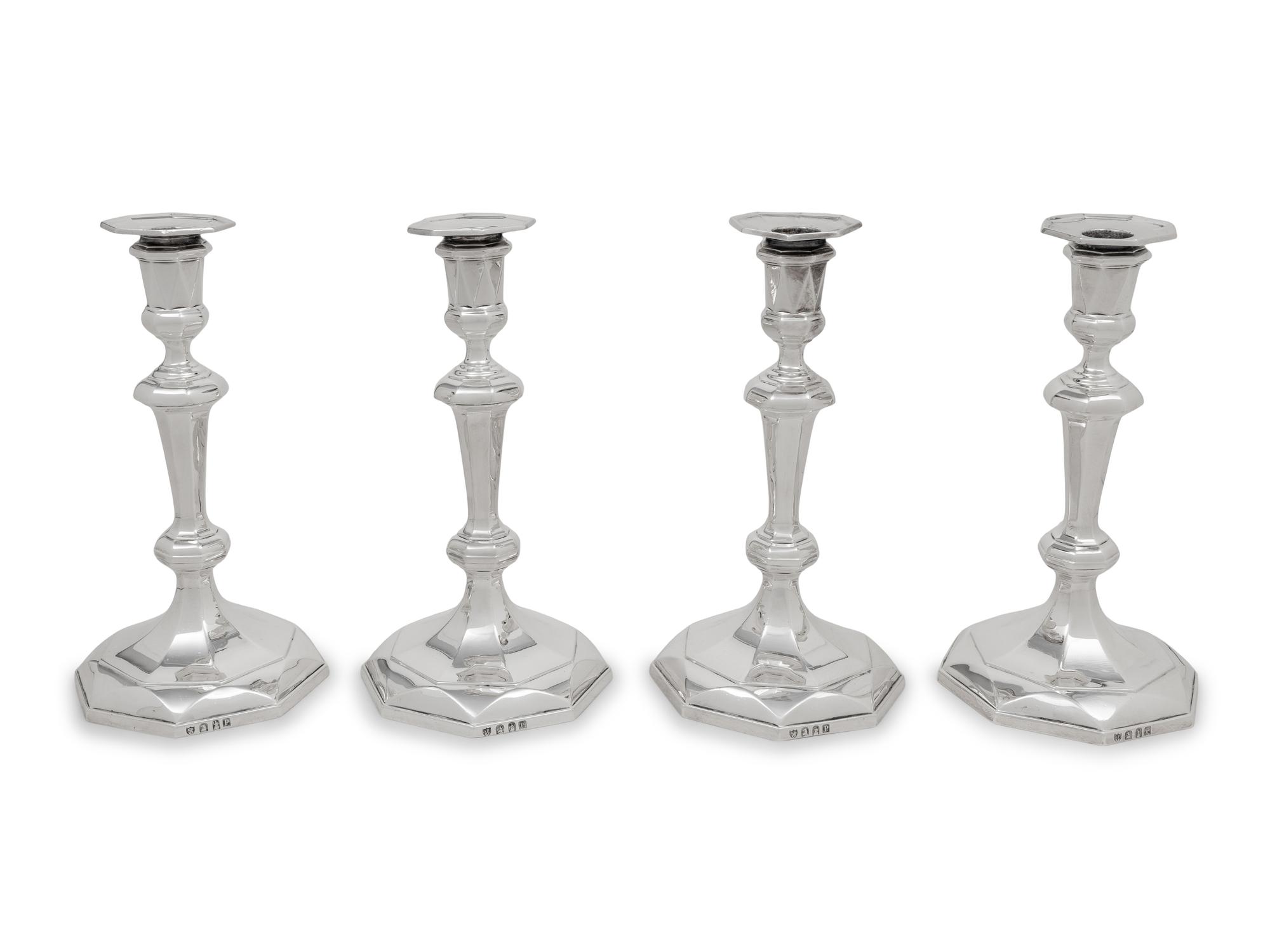 A Set of Four English Britannia Silver Candlesticks