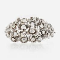 A white gold and diamond bangle