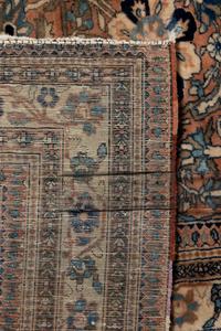A Kirman Wool Rug