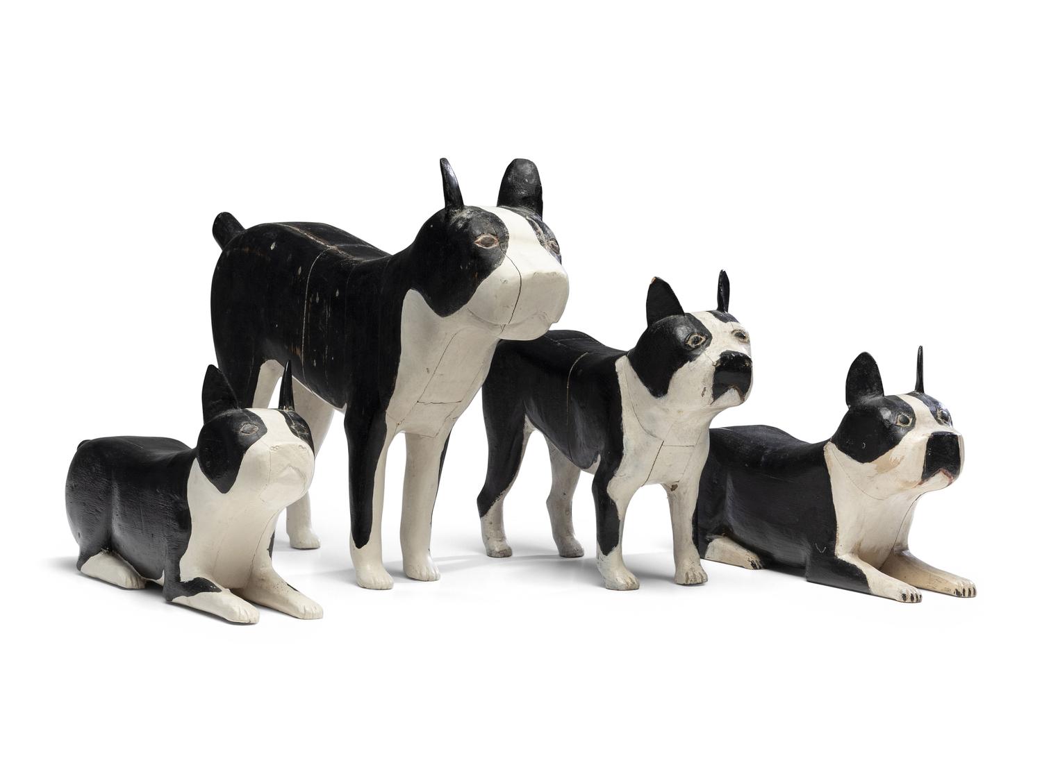 A Set of Four Carved and Painted Wood Boston Terrier Figures