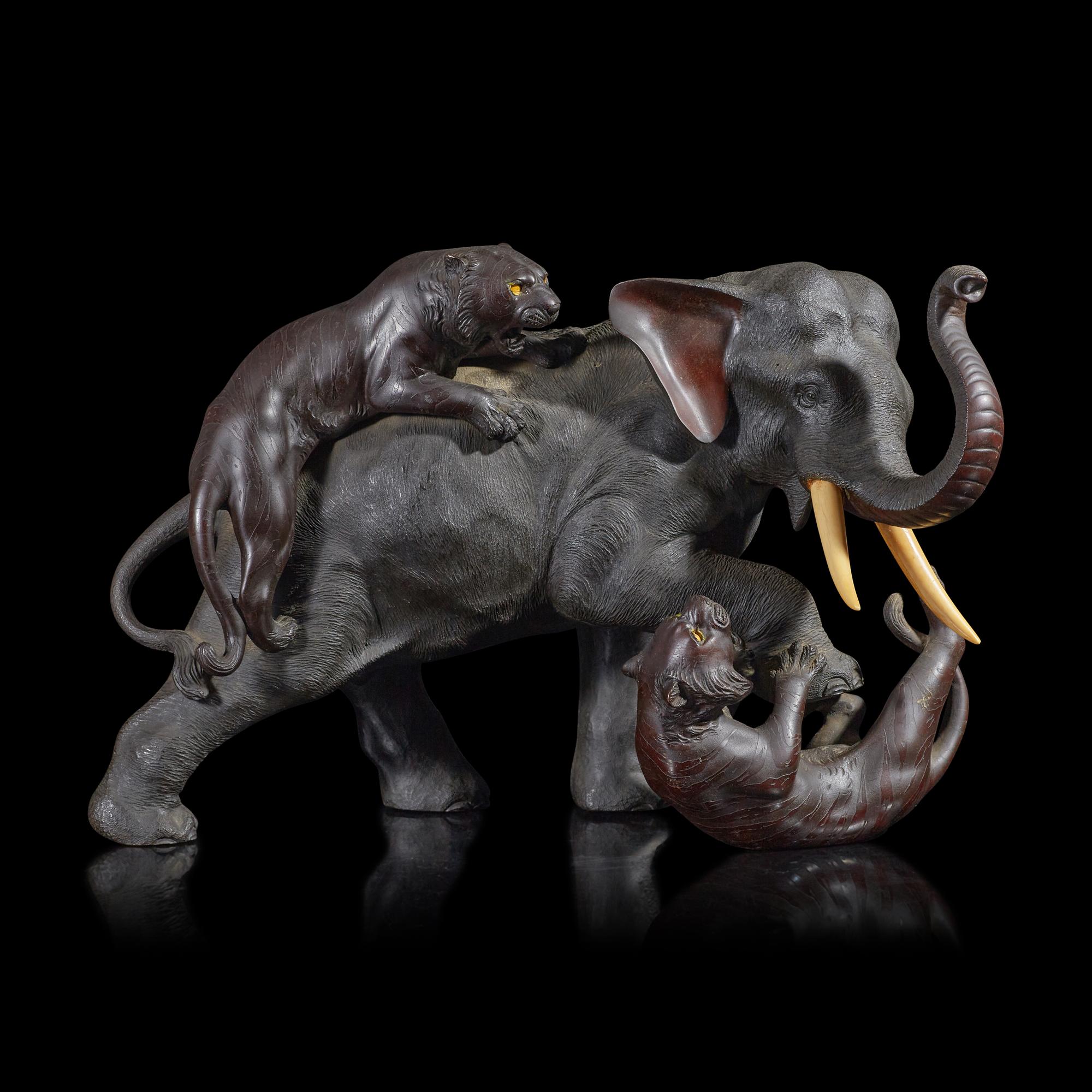 A Japanese Bronze Figural Group of Elephant and Tigers, Late Meiji to Taisho Period