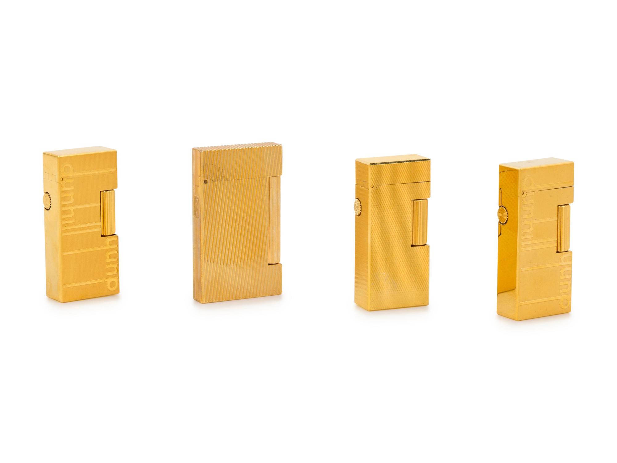 A Group of Four Dunhill Gilt Metal Lighters