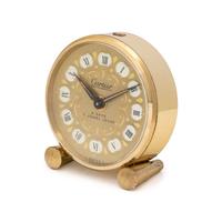 CARTIER, GILT-METAL TRAVEL ALARM CLOCK