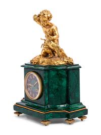A Louis XVI Style Gilt Bronze and Malachite Veneered Mantel Clock