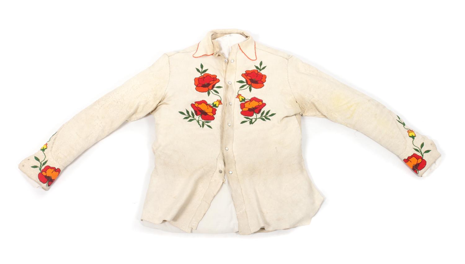 Two Crow Hide and Beaded Outfits Length of one shirt 32 inches. — MID-20TH CENTURY
