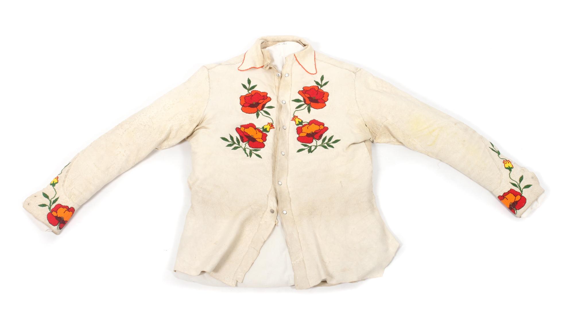 Two Crow Hide and Beaded Outfits Length of one shirt 32 inches. — MID-20TH CENTURY