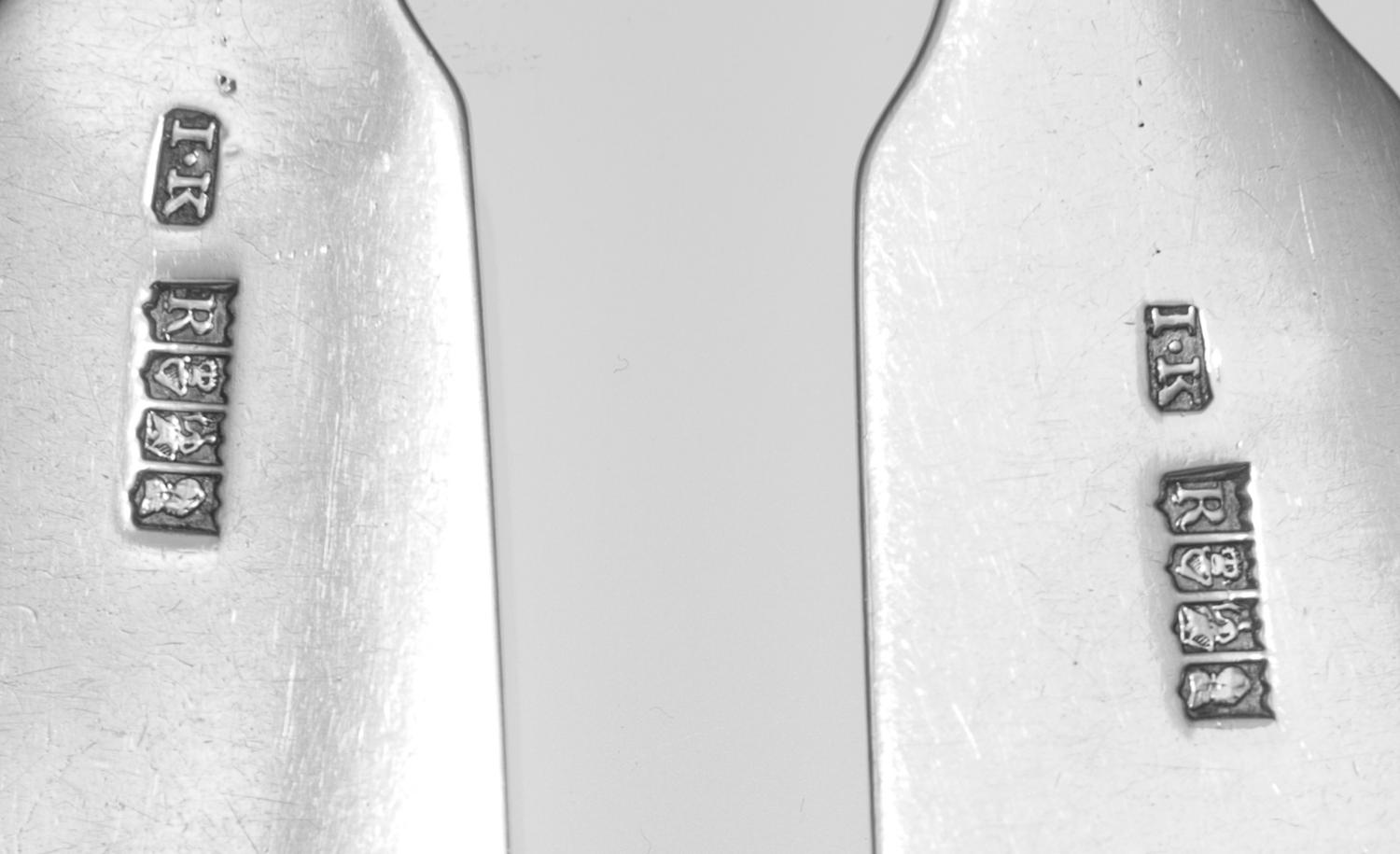 A Pair of Irish George III Silver Serving Spoons, James Keating, Dublin, 1789, of fiddle form, the handle with an engraved crest.