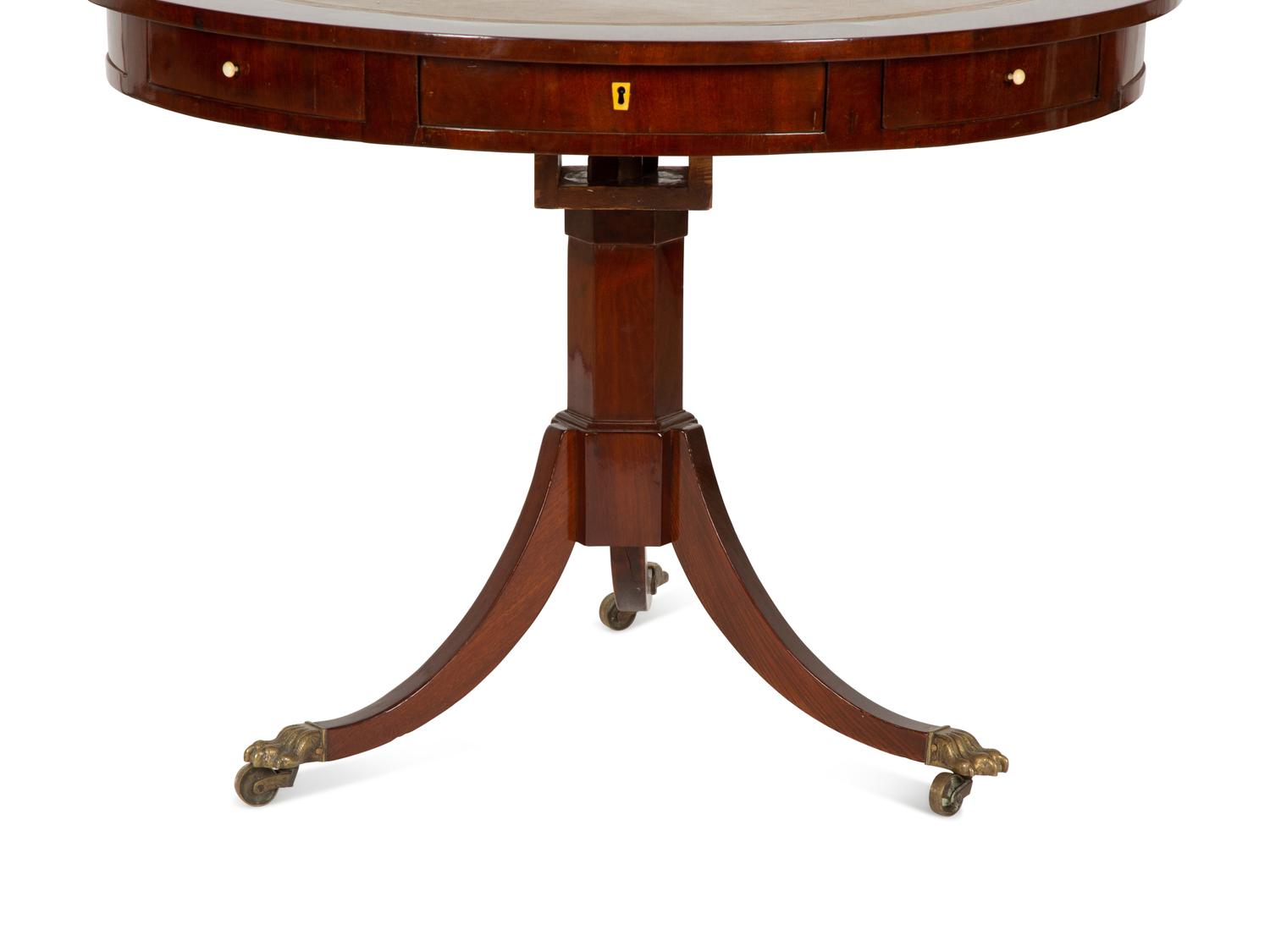A Regency Style Mahogany Center Table with Inset Brown Leather Top — 20th Century