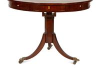 A Regency Style Mahogany Center Table with Inset Brown Leather Top — 20th Century