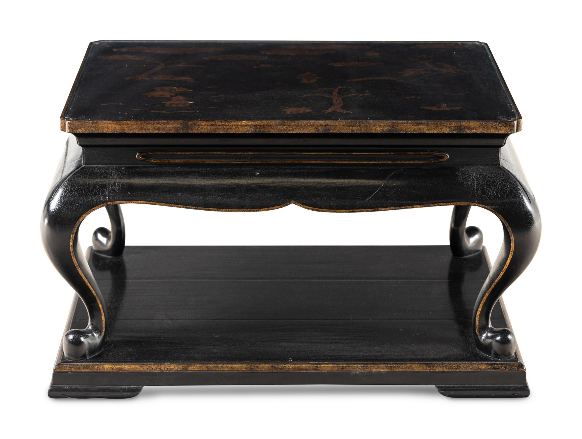 A Contemporary Ebonized and Parcel-Gilt Low Table