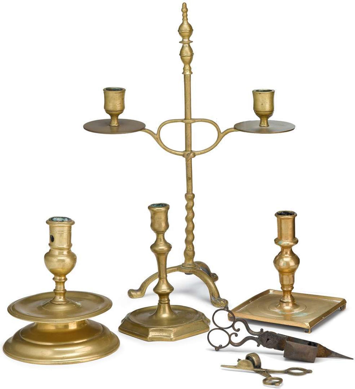 Four brass candlesticks 18th and 19th century