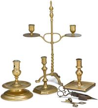 Four brass candlesticks 18th and 19th century