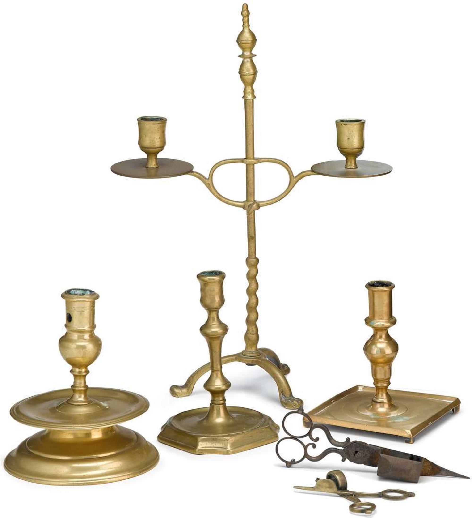 Four brass candlesticks 18th and 19th century