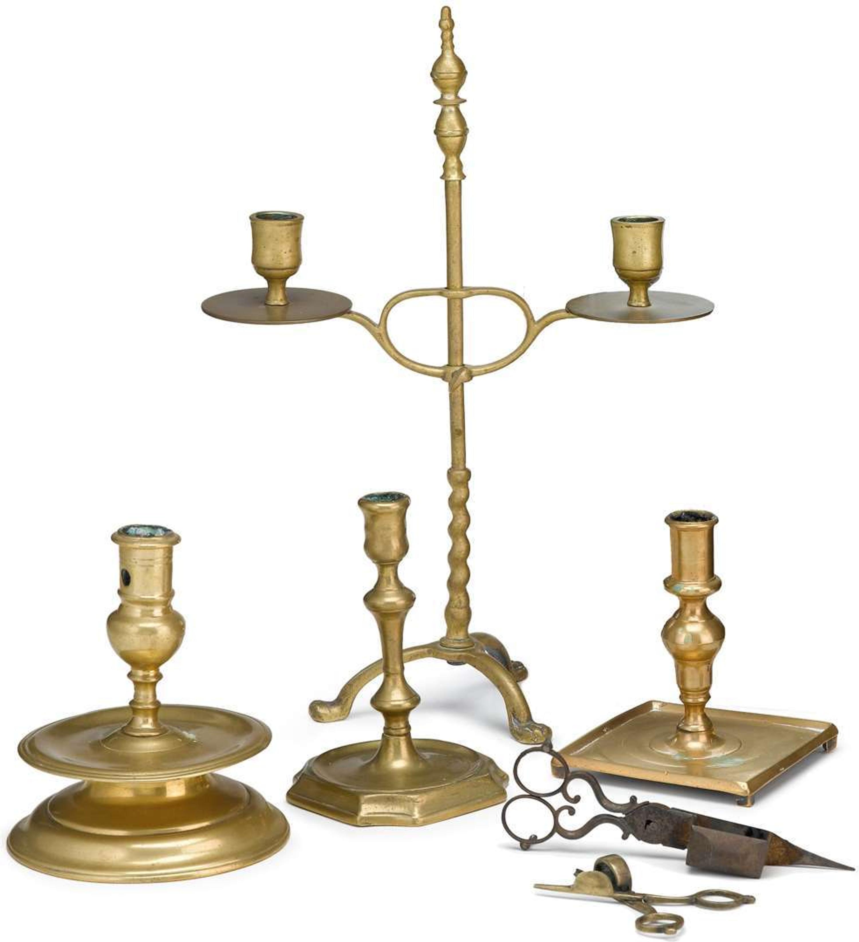 Four brass candlesticks 18th and 19th century