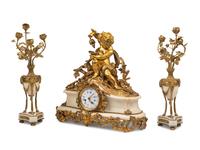 An Assembled French Gilt Bronze Mounted Marble Three-Piece Clock Garniture