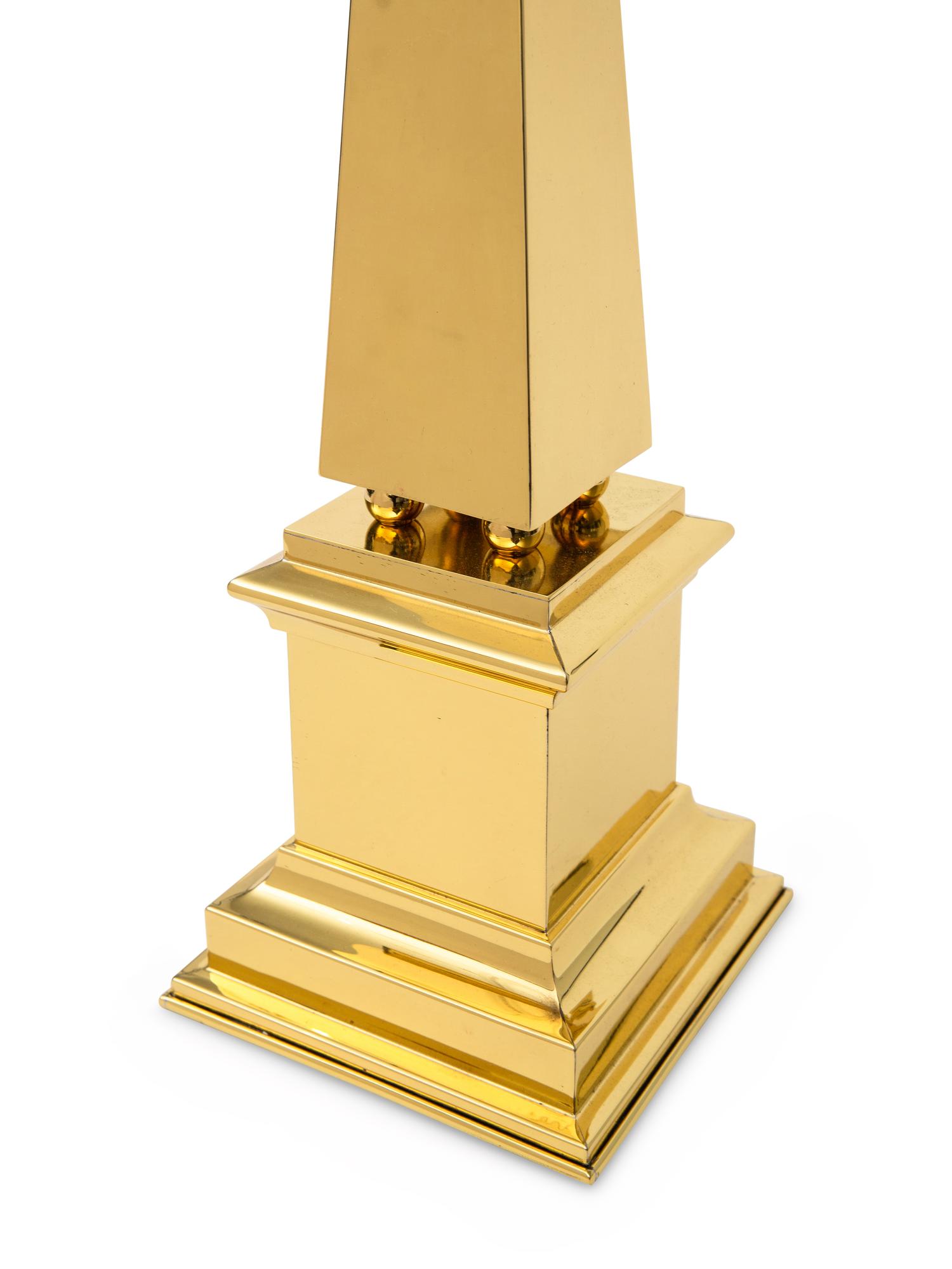A Pair of Polished Brass Obelisks