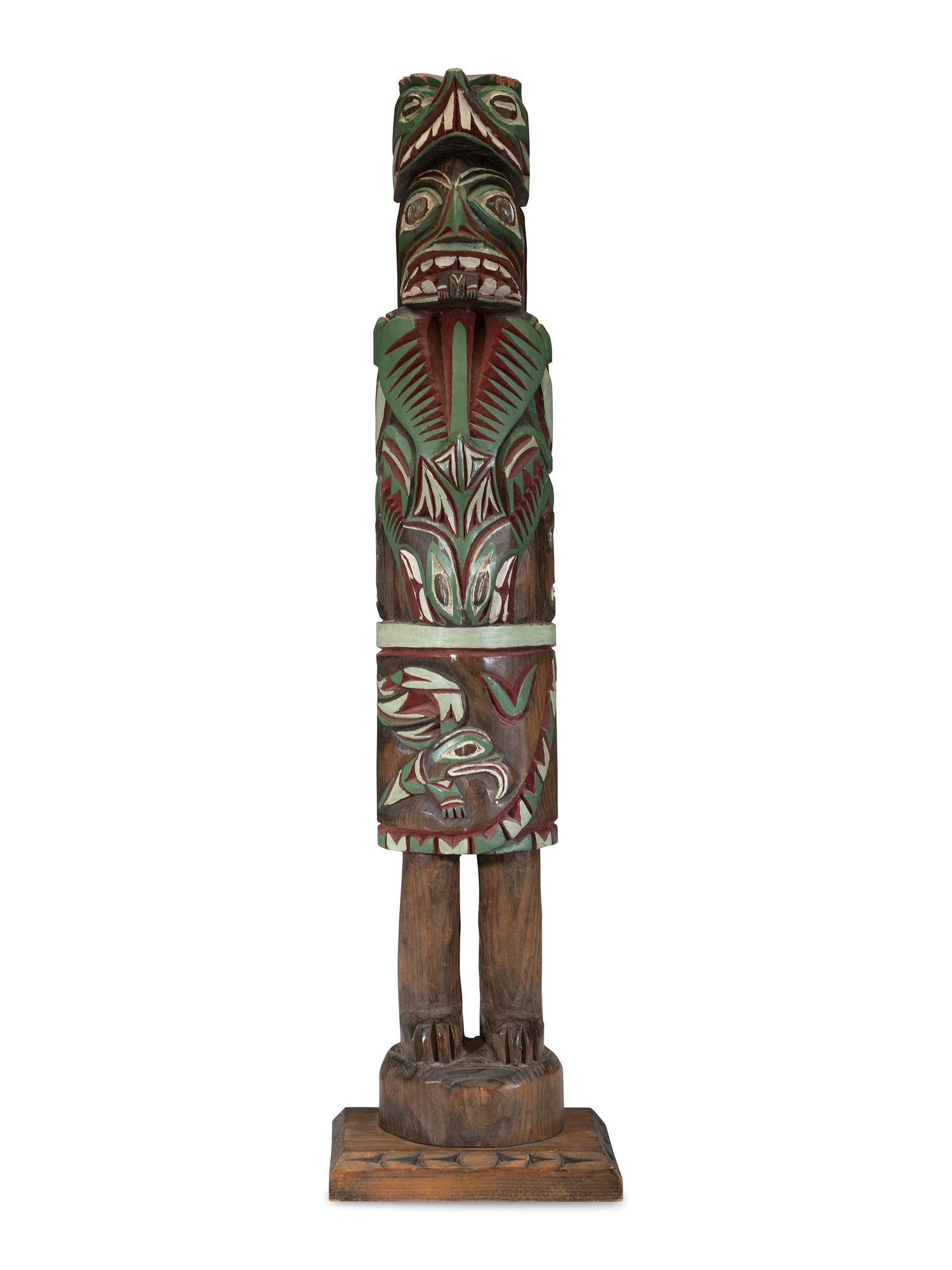 A Carved Totemic Figure, In the Northwest Coast Style