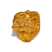 A Near Eastern Gold Ram's Head Applique