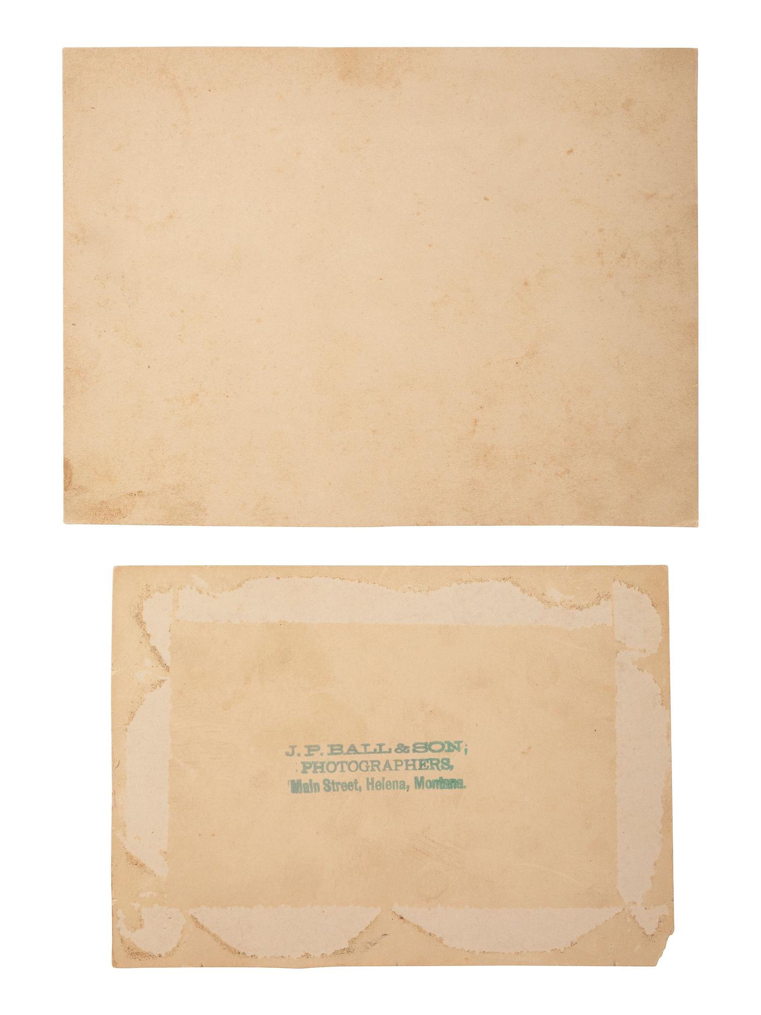 [BUFFALO SOLDIERS]. 2 photographs of "Buffalo Soldiers," Company D, 24th US Infantry, one credited to African American photographers J.P. BALL & SON, Helena, Montana. Ca 1902-1904.