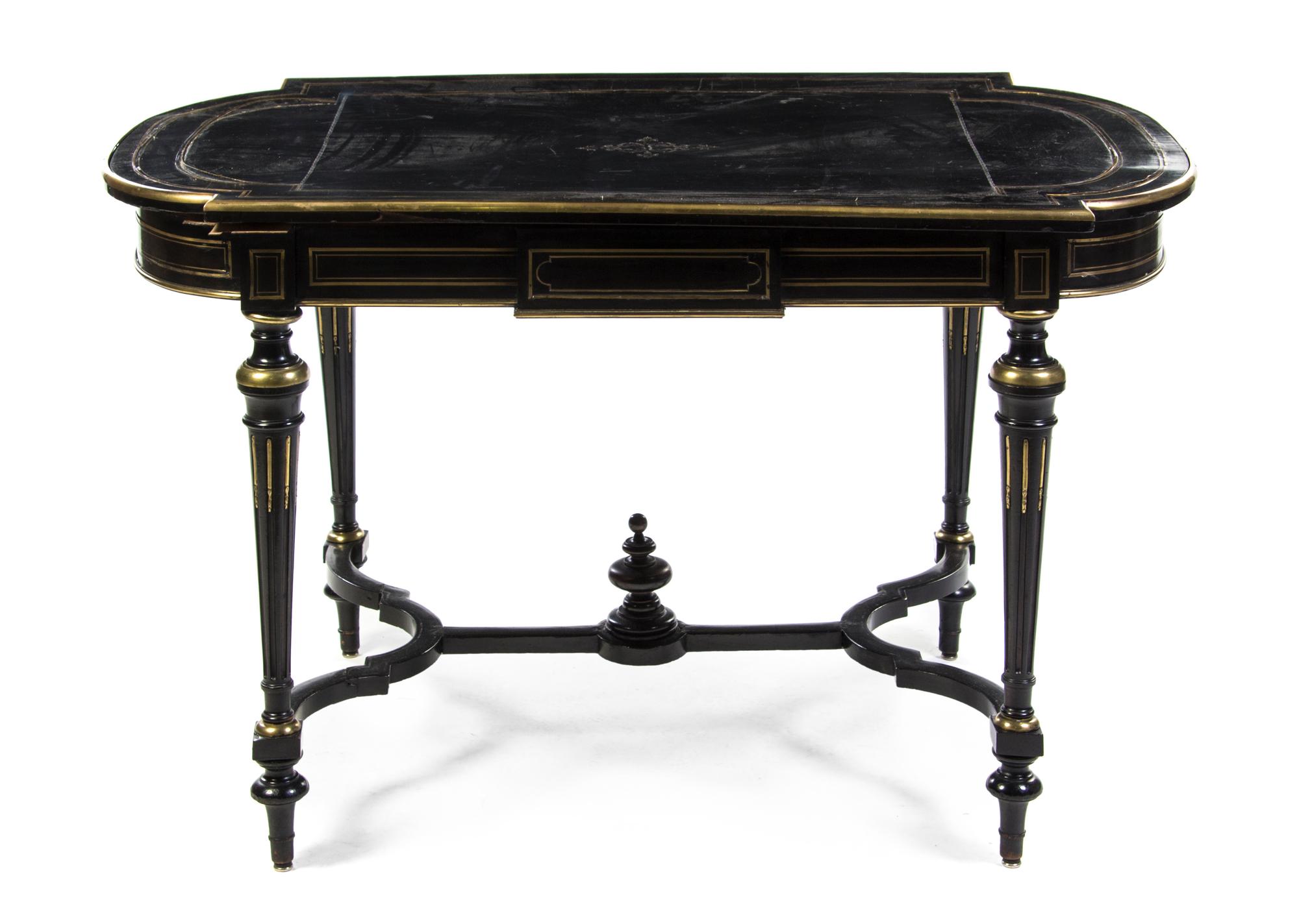 A Napoleon III Ebonized and Brass Inset Table a Milieu, Height 30 x width 51 x depth 29 1/2 inches.