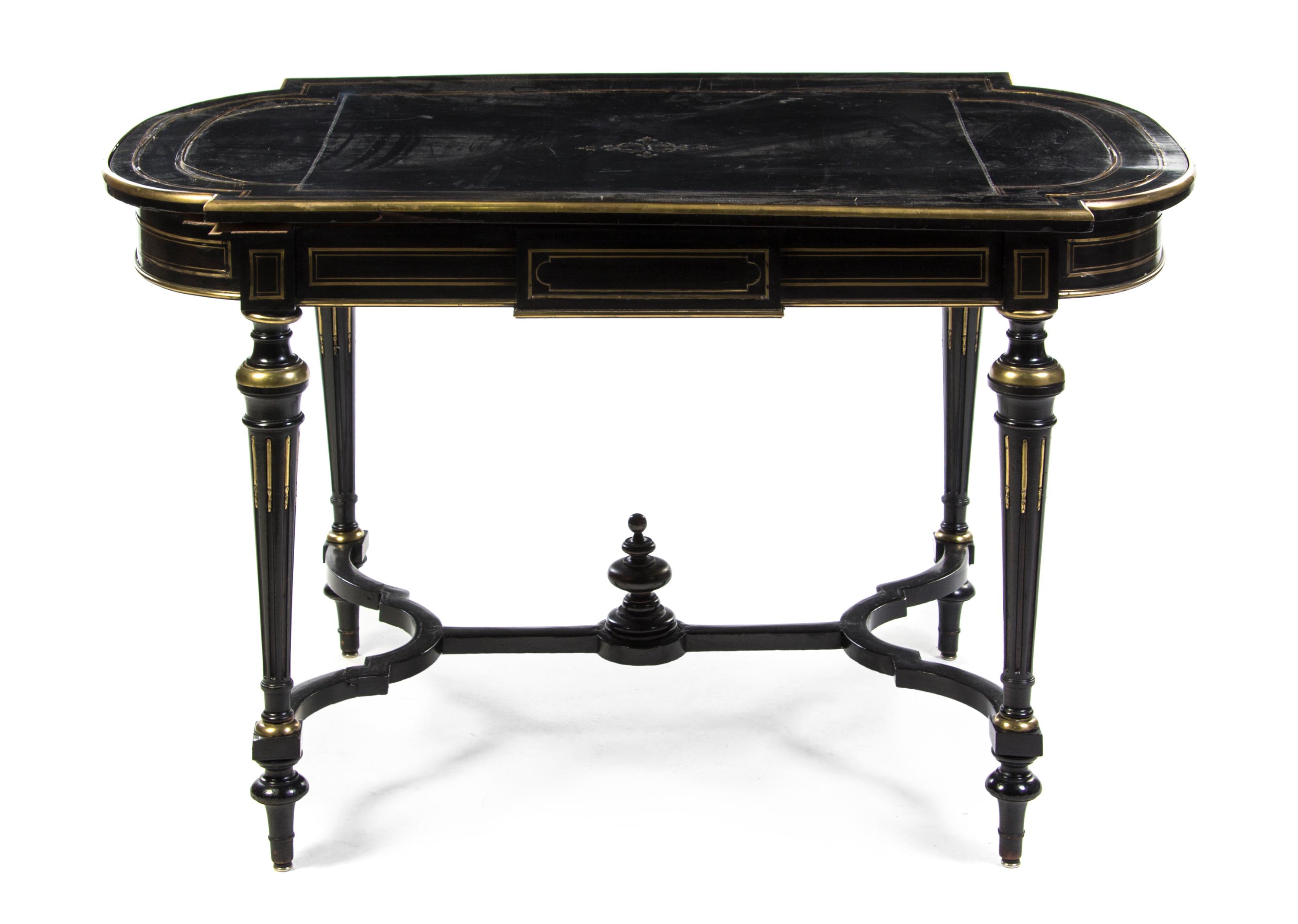 A Napoleon III Ebonized and Brass Inset Table a Milieu, Height 30 x width 51 x depth 29 1/2 inches.