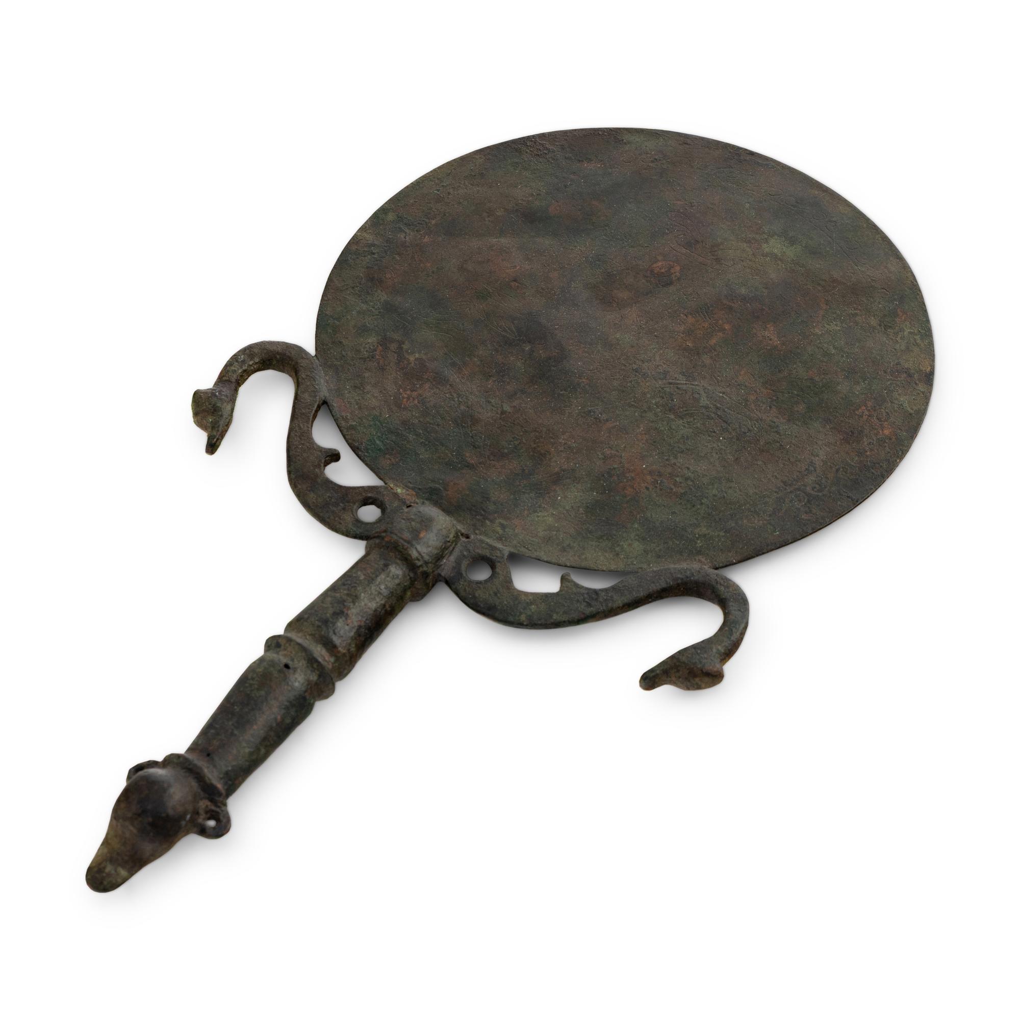 An Etruscan Style Bronze Mirror