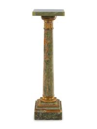 A Neoclassical Gilt Metal Mounted Onyx Pedestal