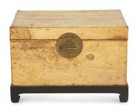 A Chinese Parchment Leather Bound Trunk with Brass Mounts and Handles