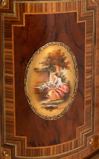 A Louis XVI Style Gilt Bronze Mounted Various Woods Console Cabinet