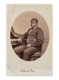 [MUSIC - WIGGINS, Thomas Greene "Blind Tom" (1849-1908)]. WARREN, George Kendall (1824-1884), photographer. Cabinet card of Blind Tom.