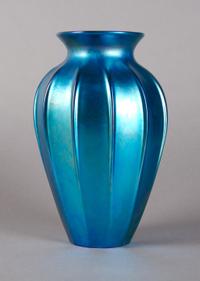 An Iridescent Glass Vase, in the Manner of Steuben, Height 8 inches.