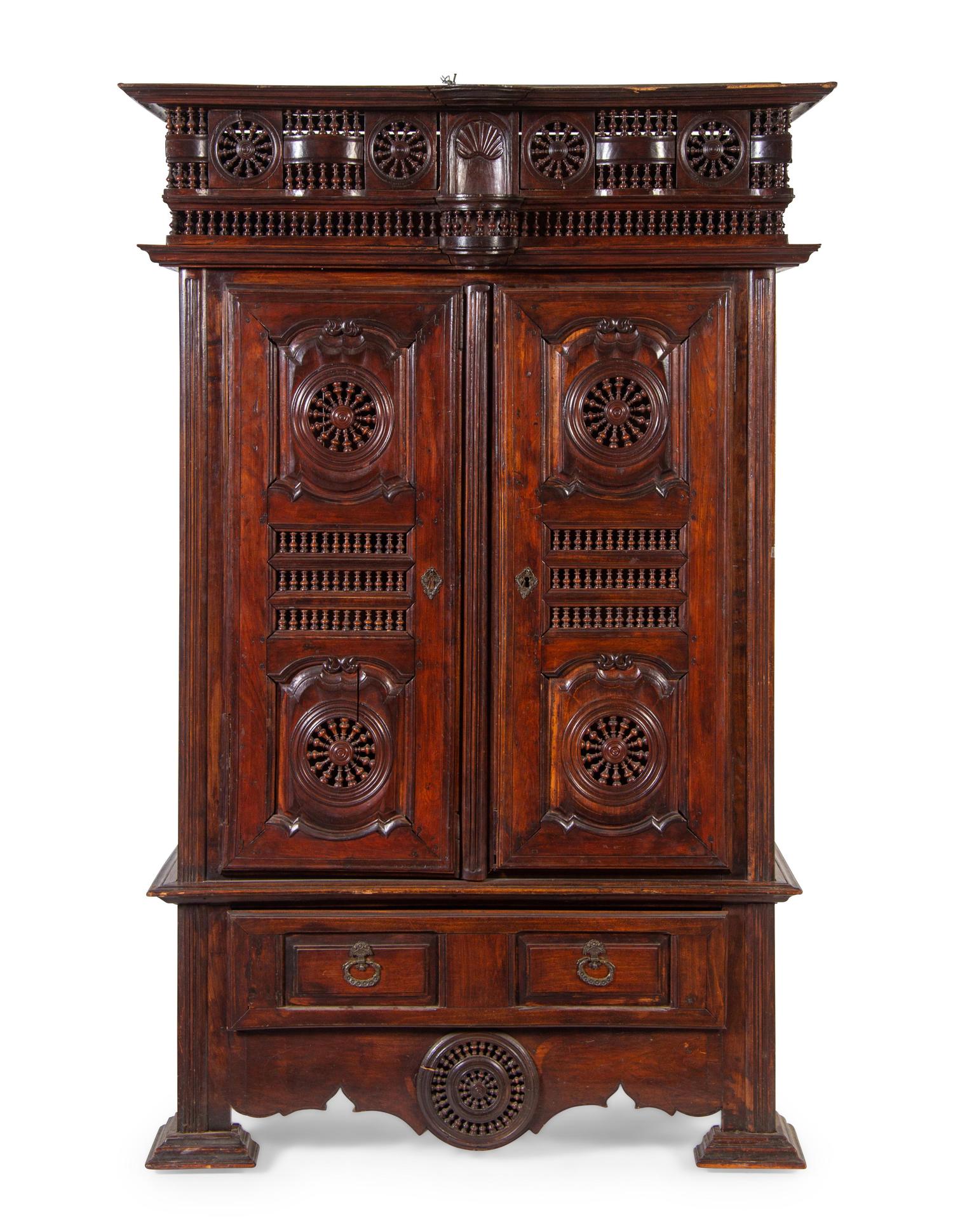 A Brittany Style Carved Walnut Armoire