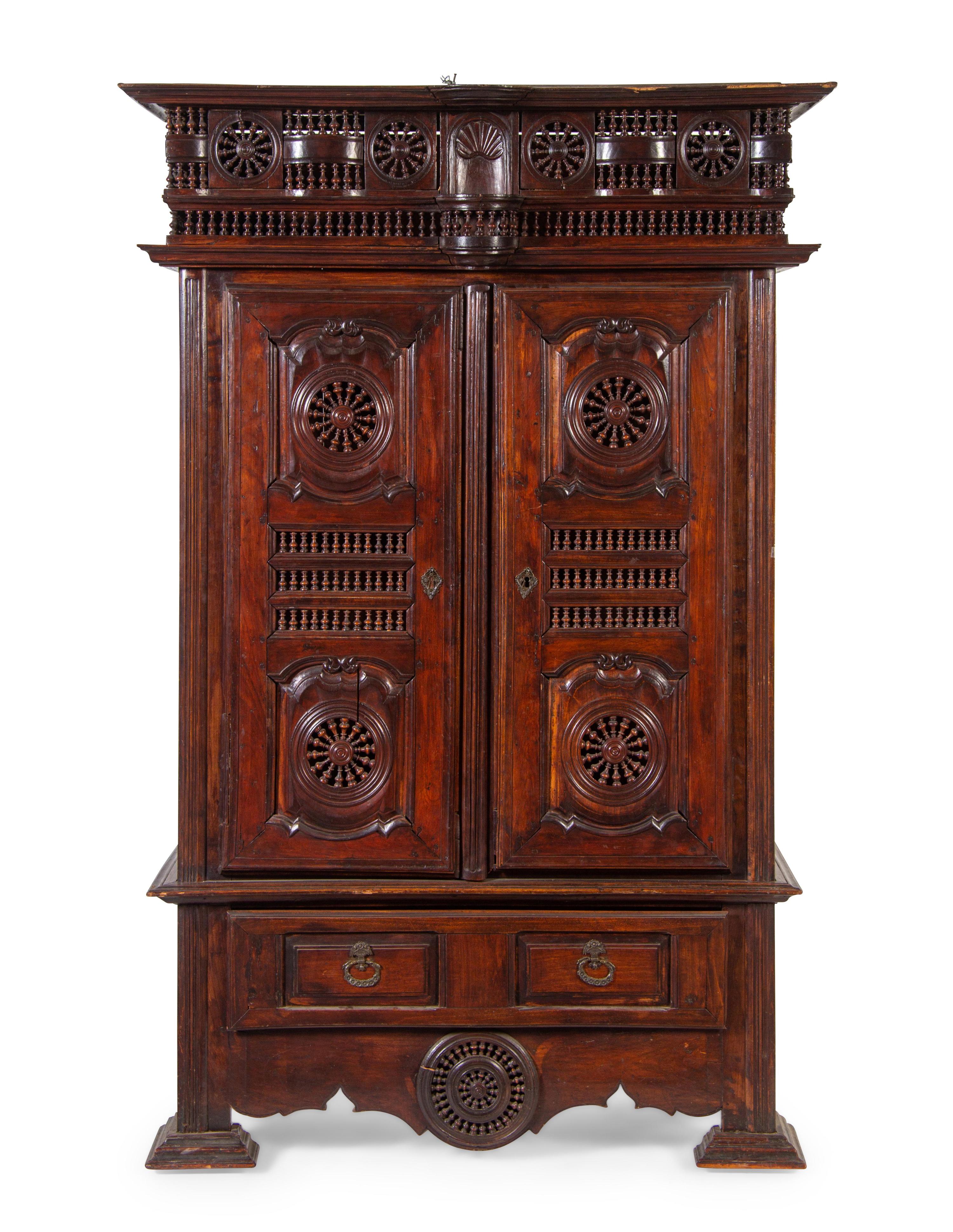 A Brittany Style Carved Walnut Armoire