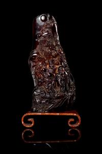 A Large Carved Amber Boulder Height 9 1/2 inches. — 20TH CENTURY