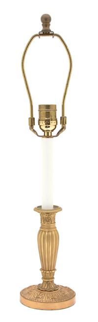 A French Empire Style Gilt Bronze Candlestick-Form Lamp Height overall 20 1/2 inches. — 20TH CENTURY