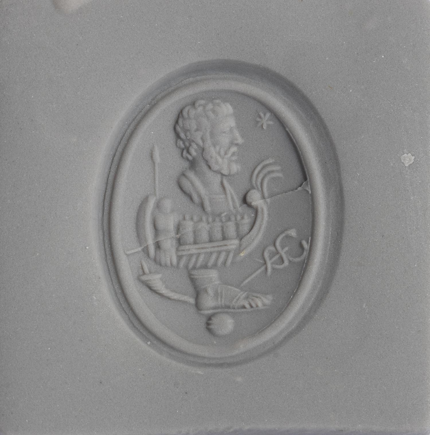 A Carnelian Ring Stone with an Allegorical Scene, After the Antique — Set in a gold ring; Hallmarks stamped on the back