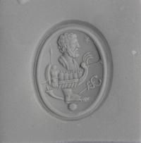 A Carnelian Ring Stone with an Allegorical Scene, After the Antique — Set in a gold ring; Hallmarks stamped on the back