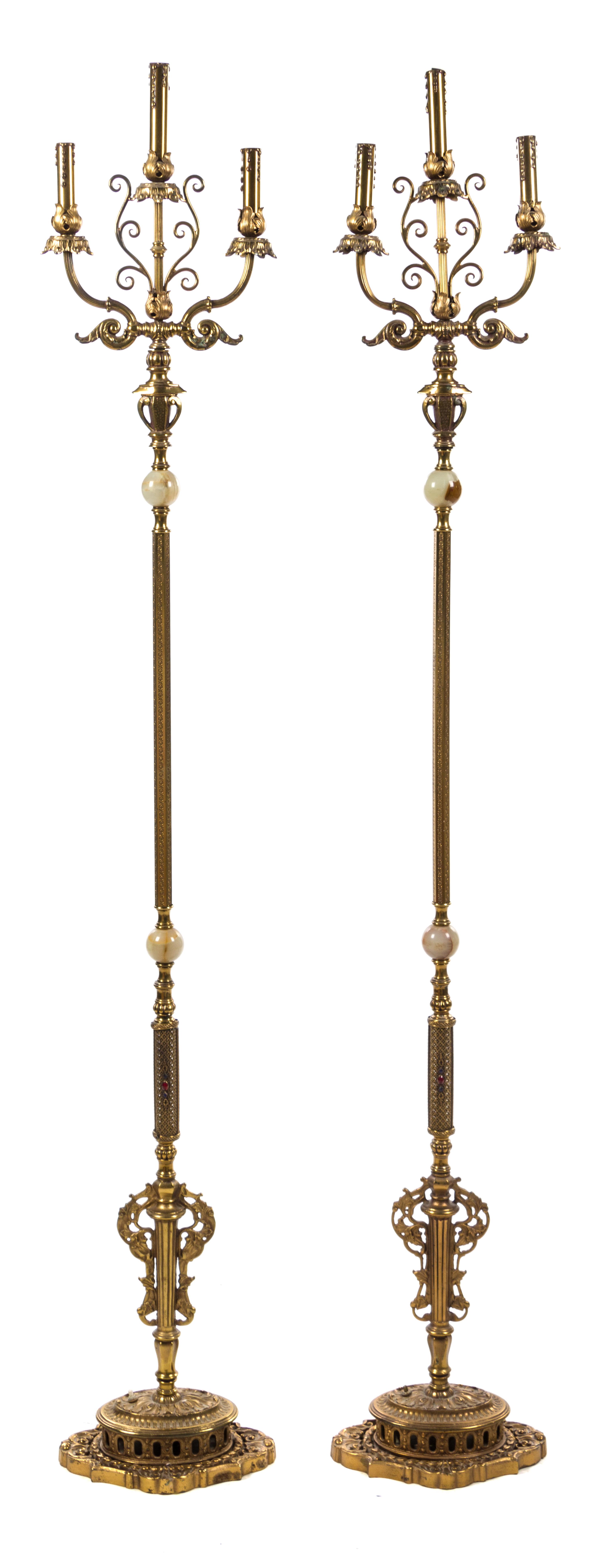 A Pair of Gilt Bronze and Onyx Three-Light Floor Lamps Height 68 1/2 inches.