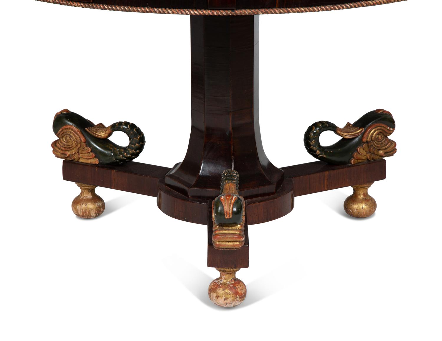 An Italian Parquetry, Ebonized and Parcel Gilt Extending Dining Table